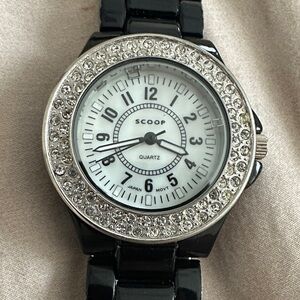 Scoop Black and Silver Watch with Crystal Accents. Band is ceramic.